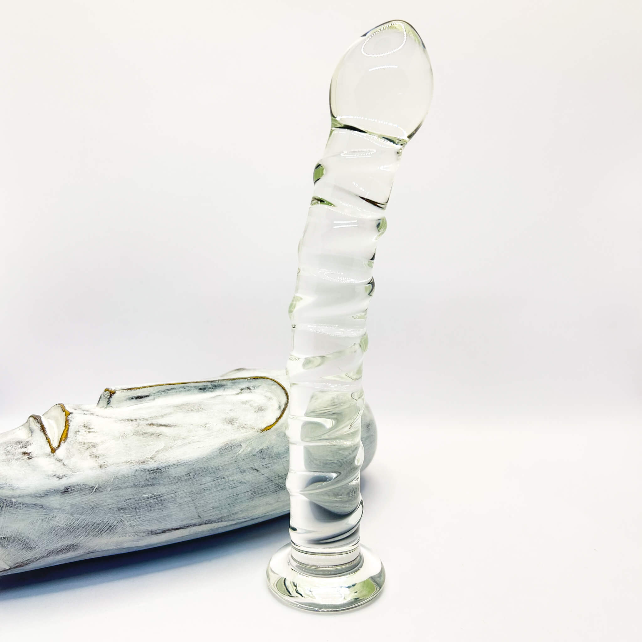 Curved swirly glass dildo