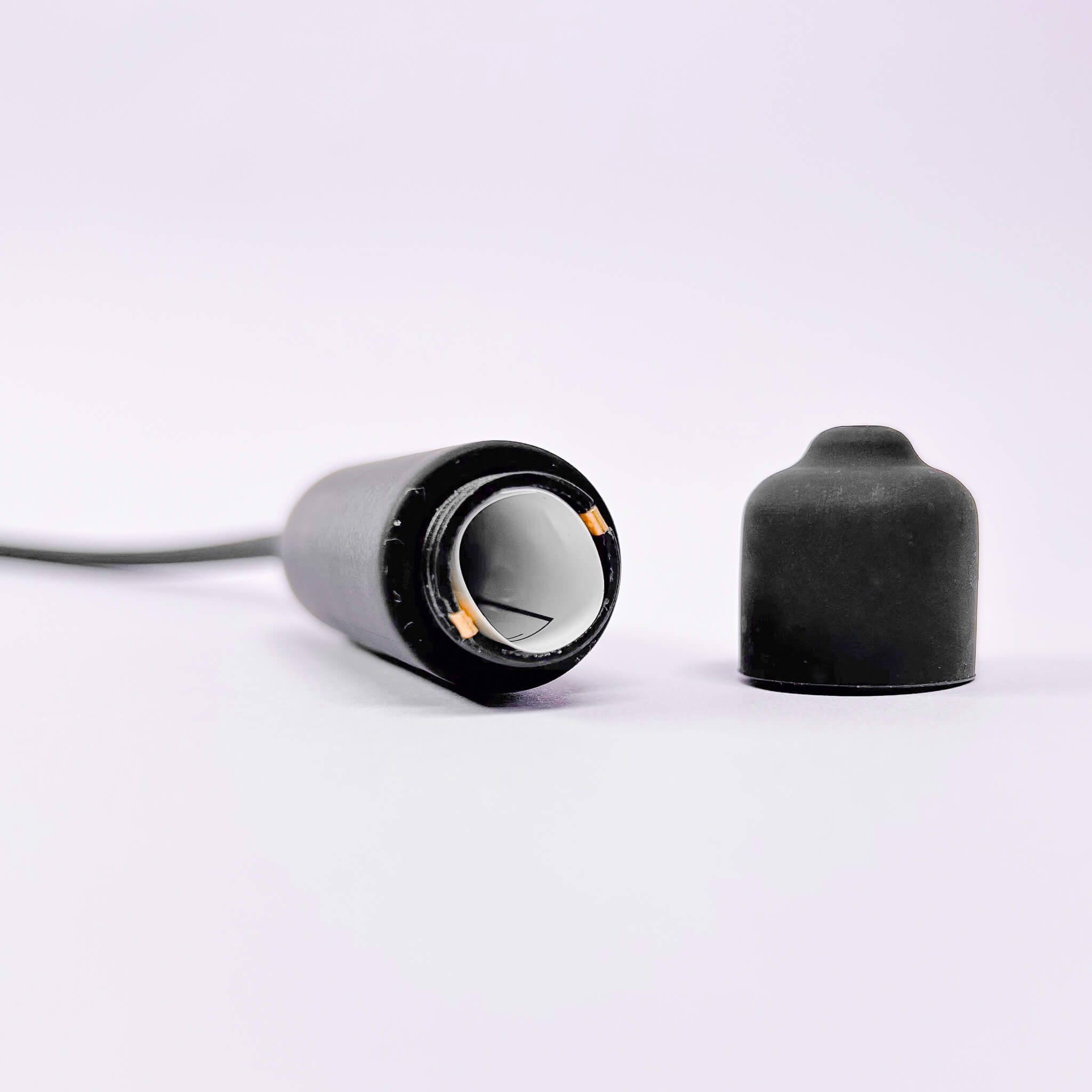 Long Urethral Vibrator Plug Black on a white background