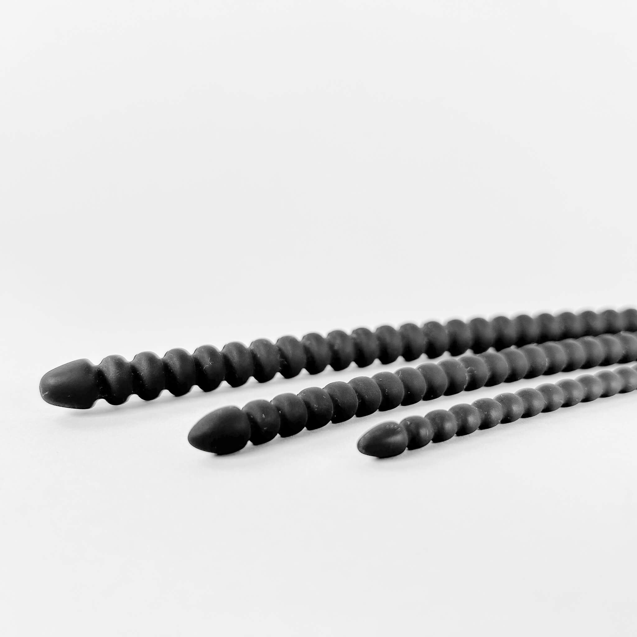 Ribbed Silicone Urethral Plug on a white background