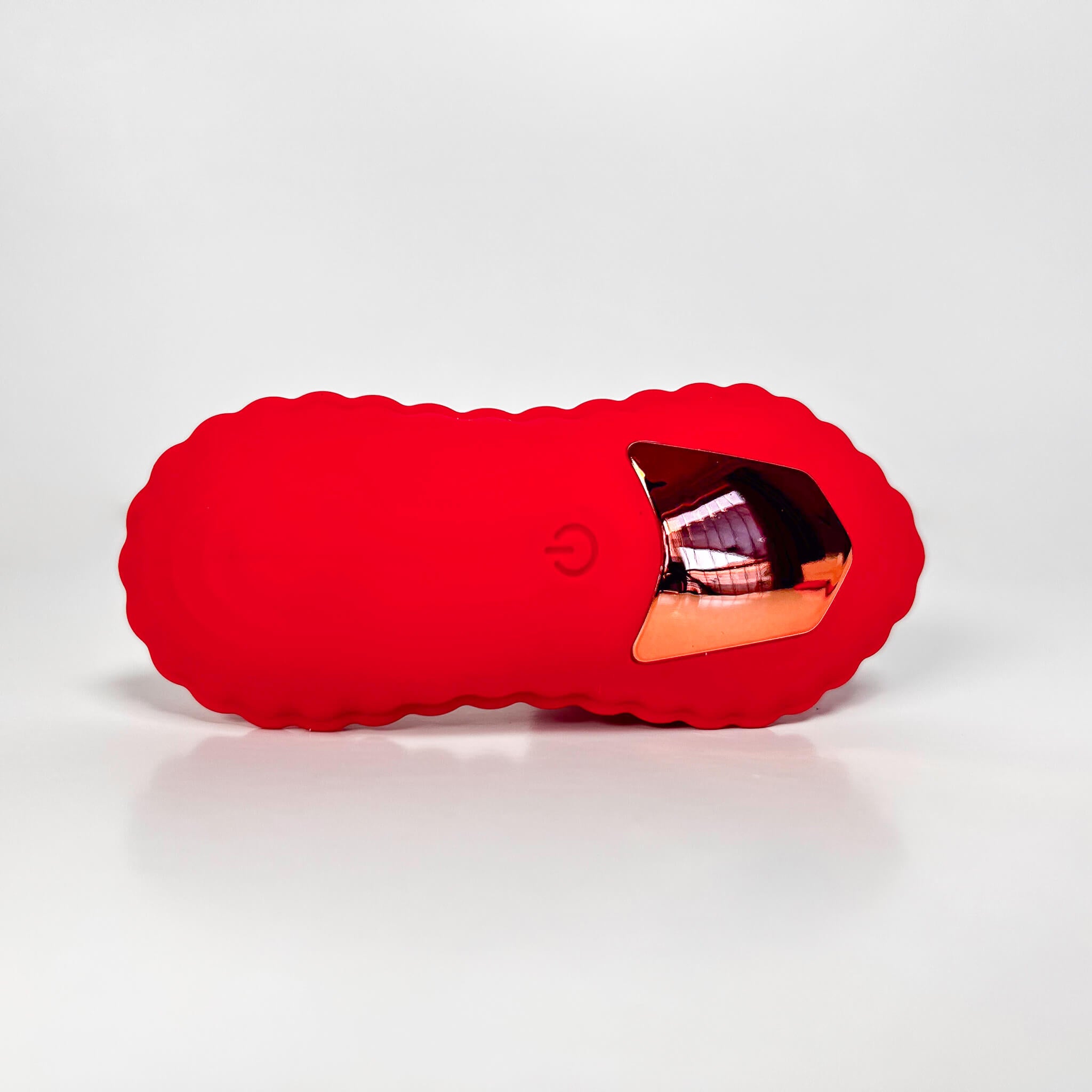 Red silicone Rose insertable vibrator with a reflective interior on a white background