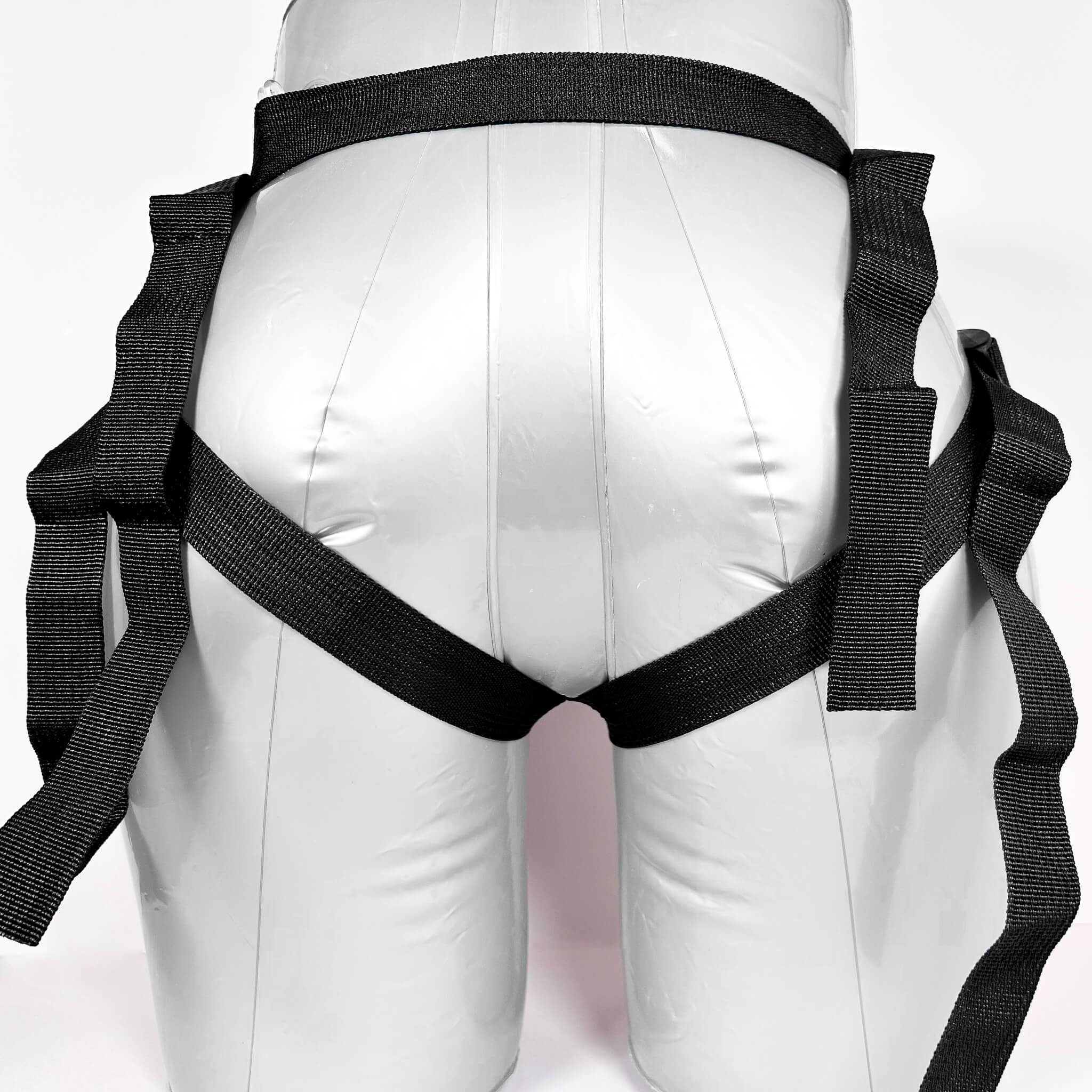 Black harness on a white mannequin