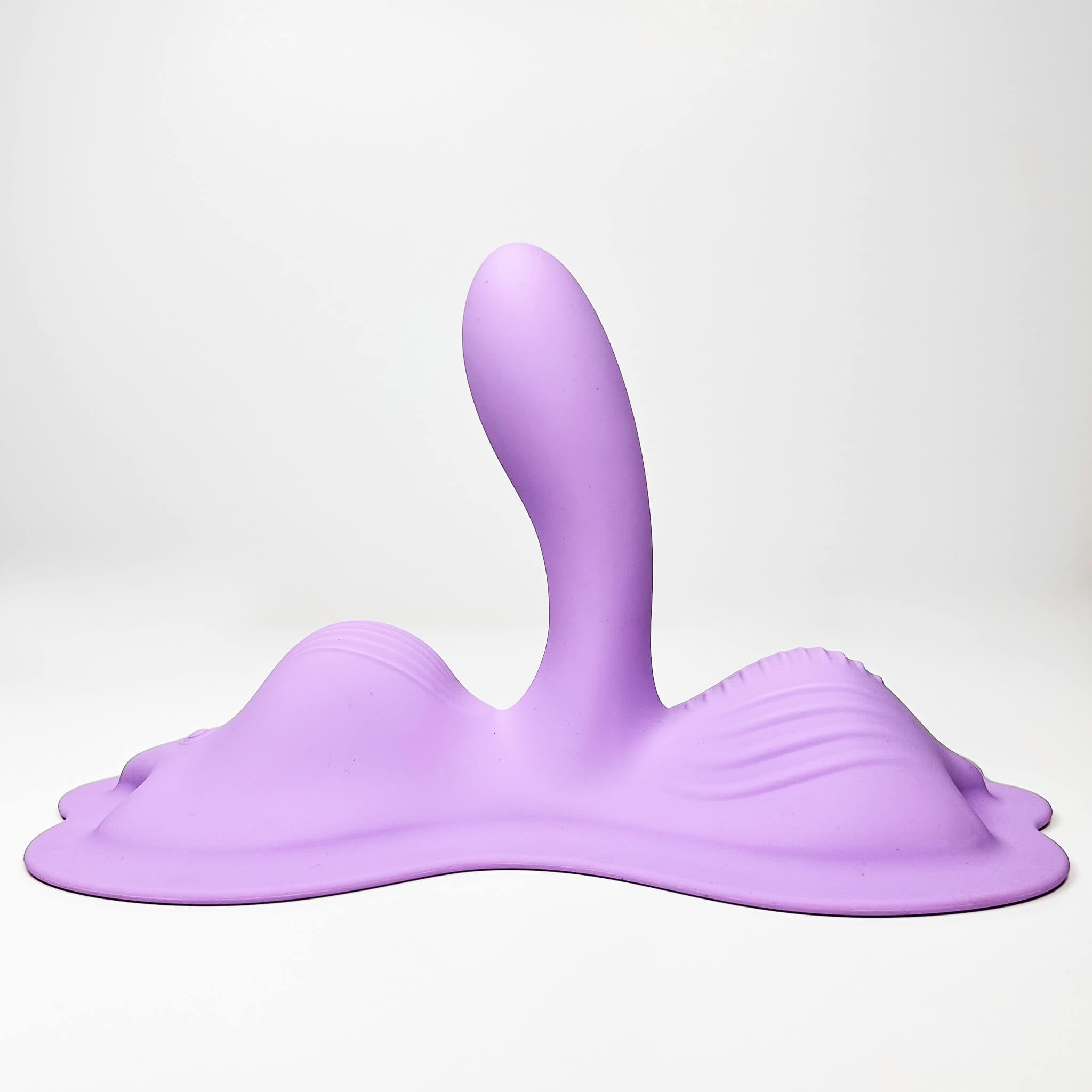 Purple silicone Triple Tease Cowgirl Cushion Vibrator (App-Controlled) on a white background