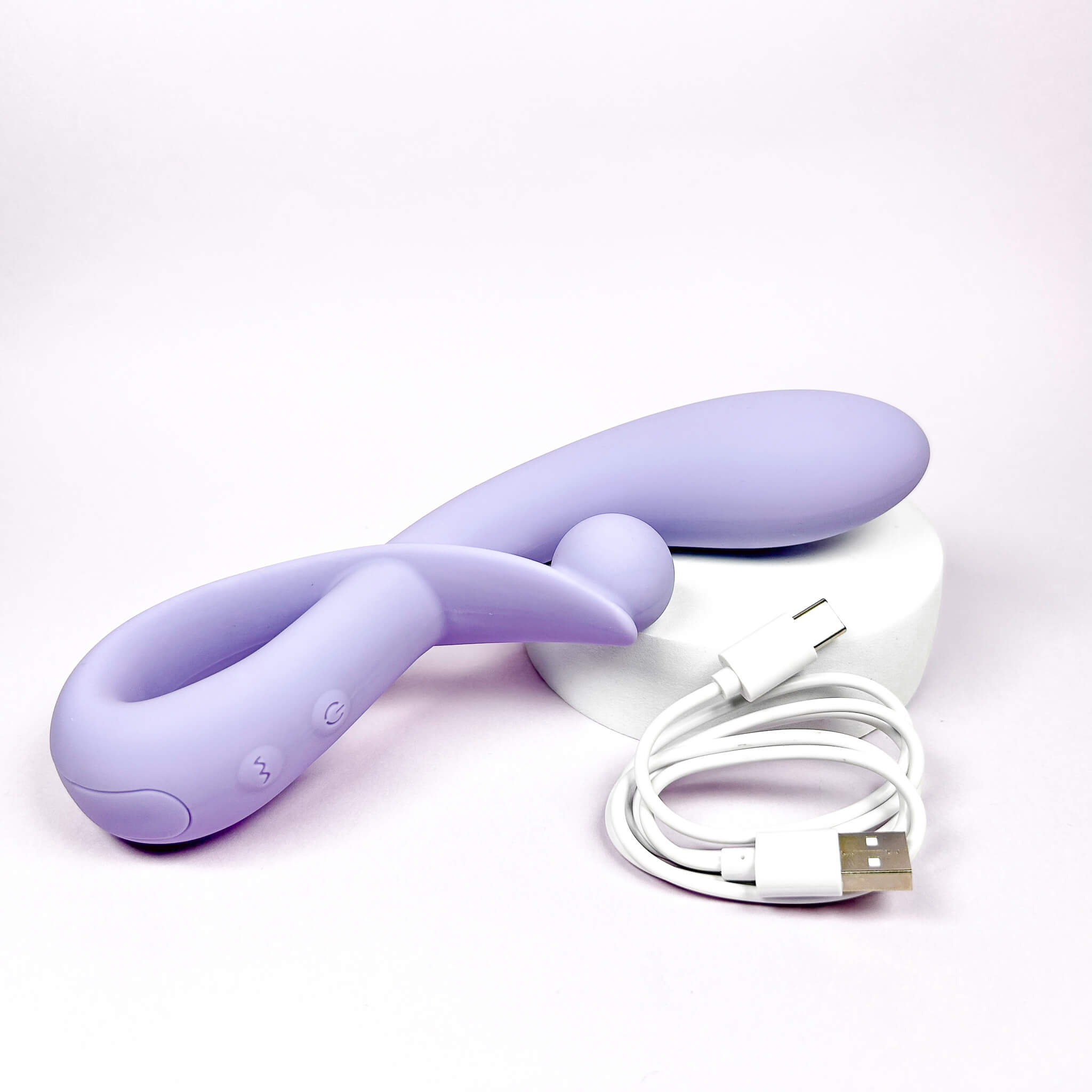 Purple rabbit vibrator with USB cable on a white background