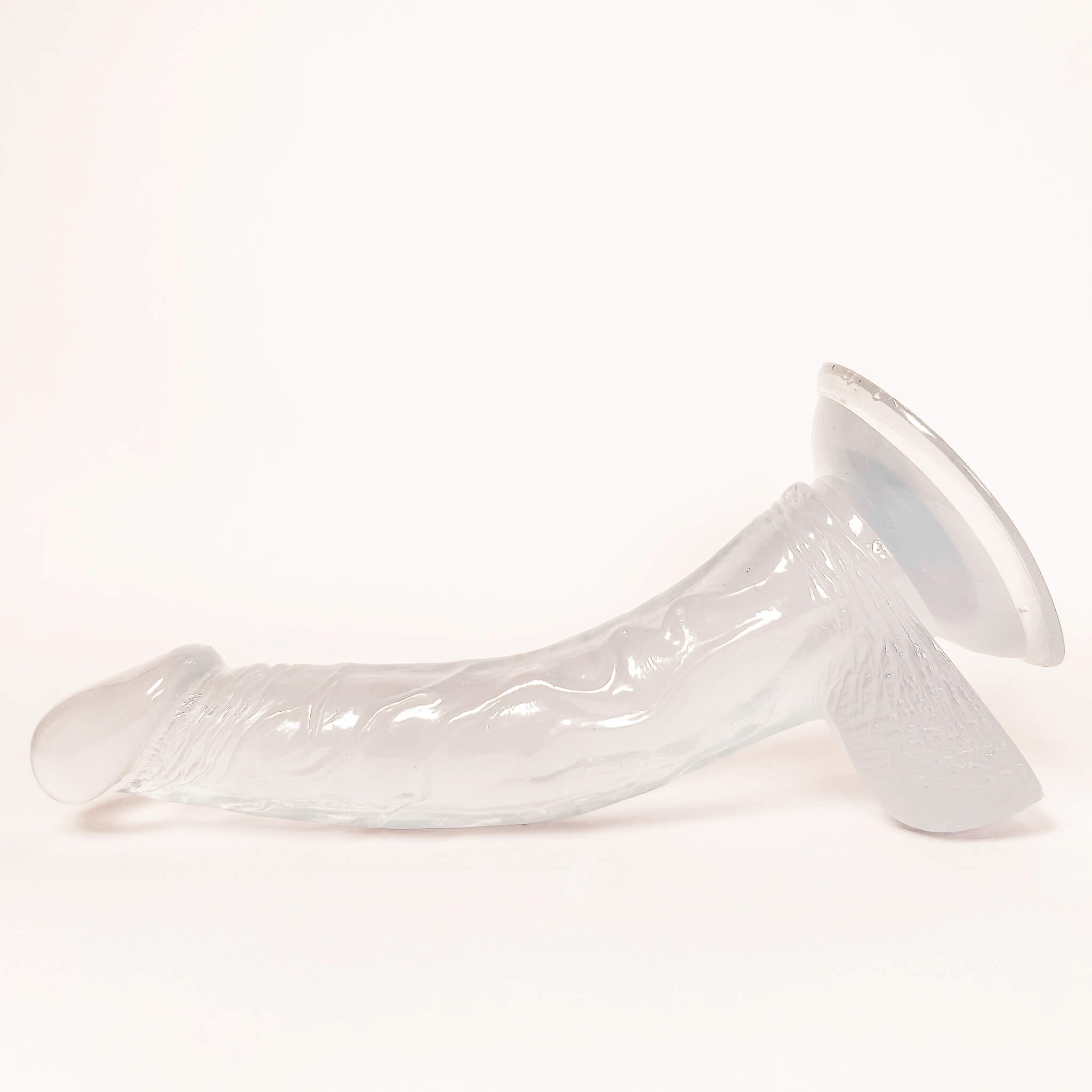 curved dildo online on a white background