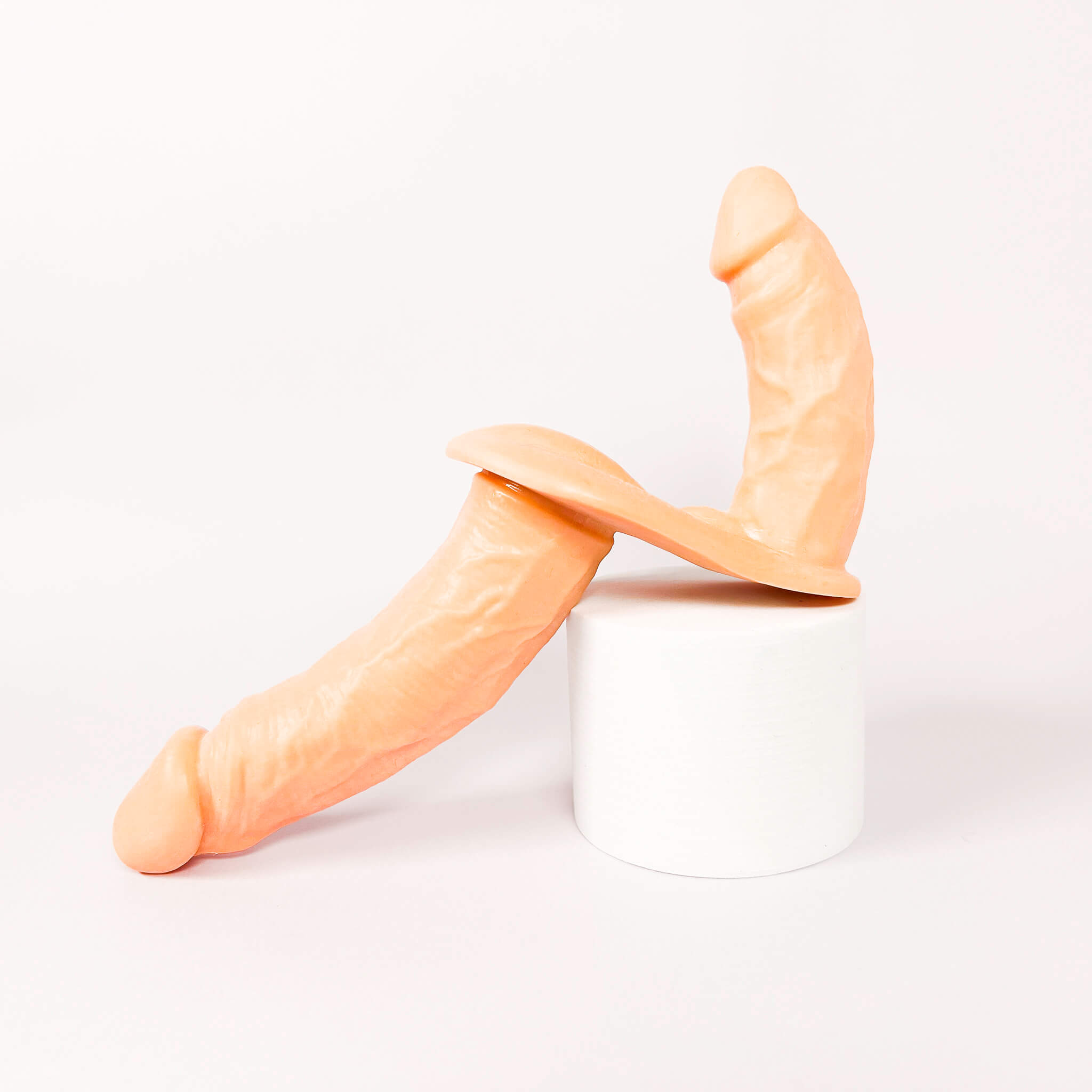double strap-on dildo on a white background