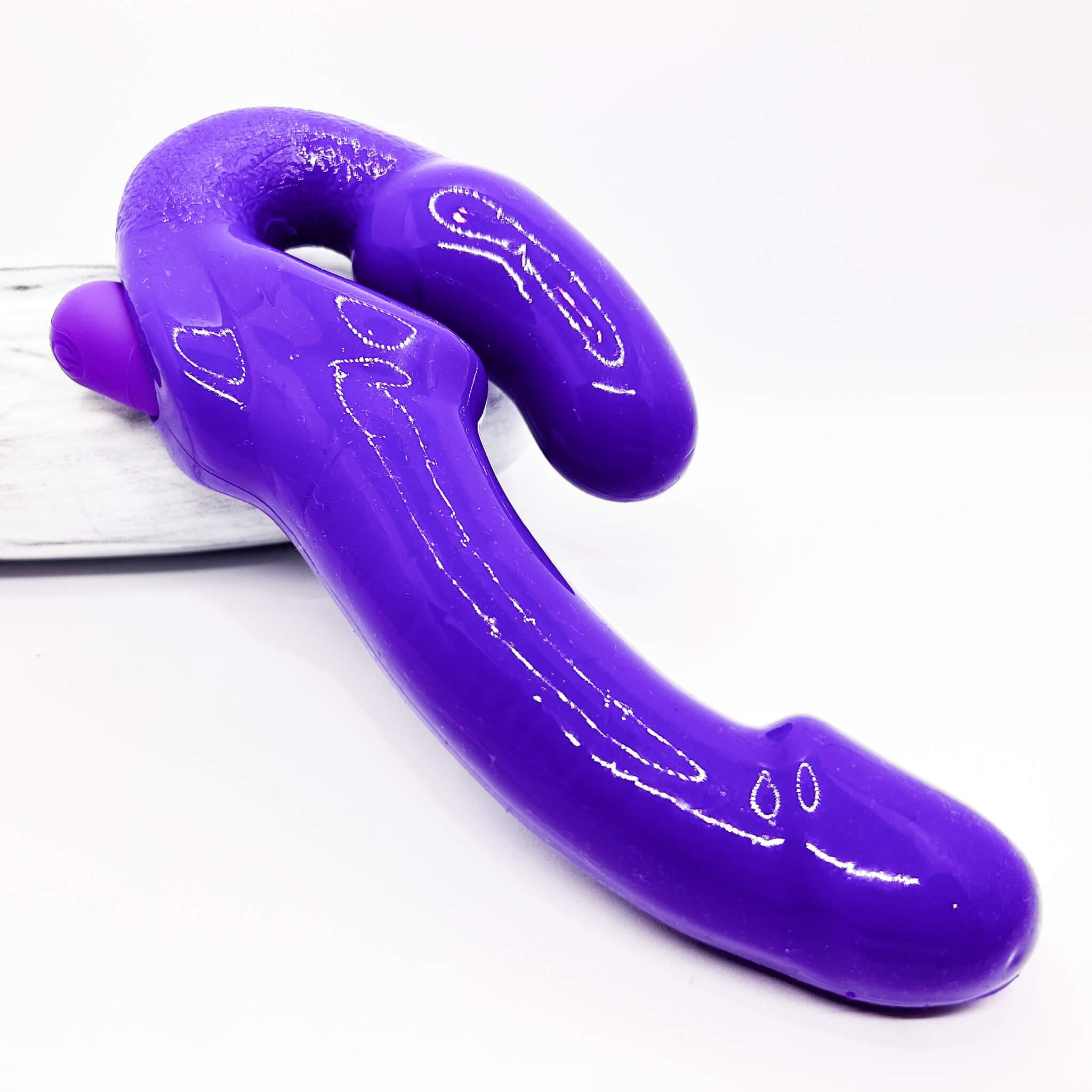 vibrating strapless strap on purple