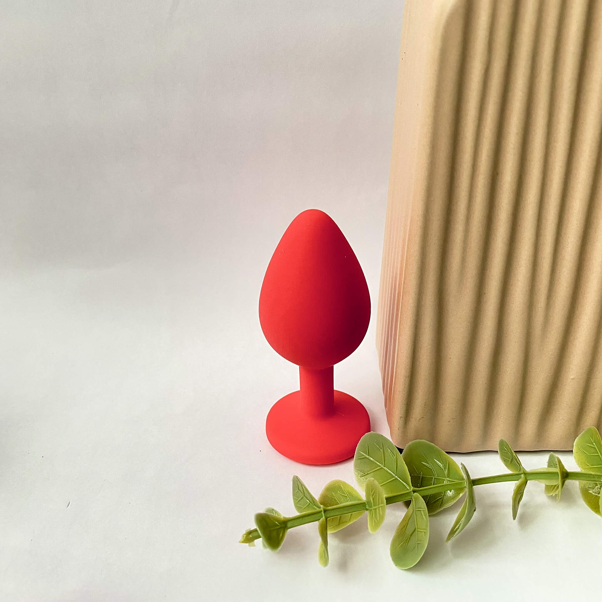 medium silicone jeweled butt plug red