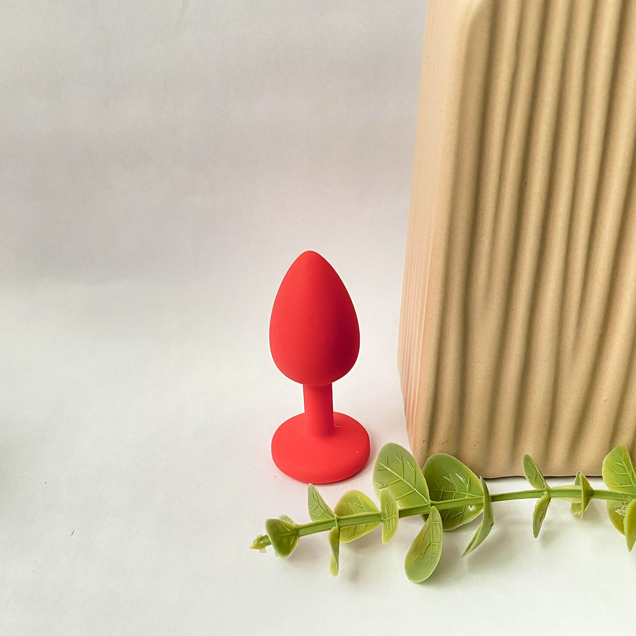 small silicone jeweled butt plug red