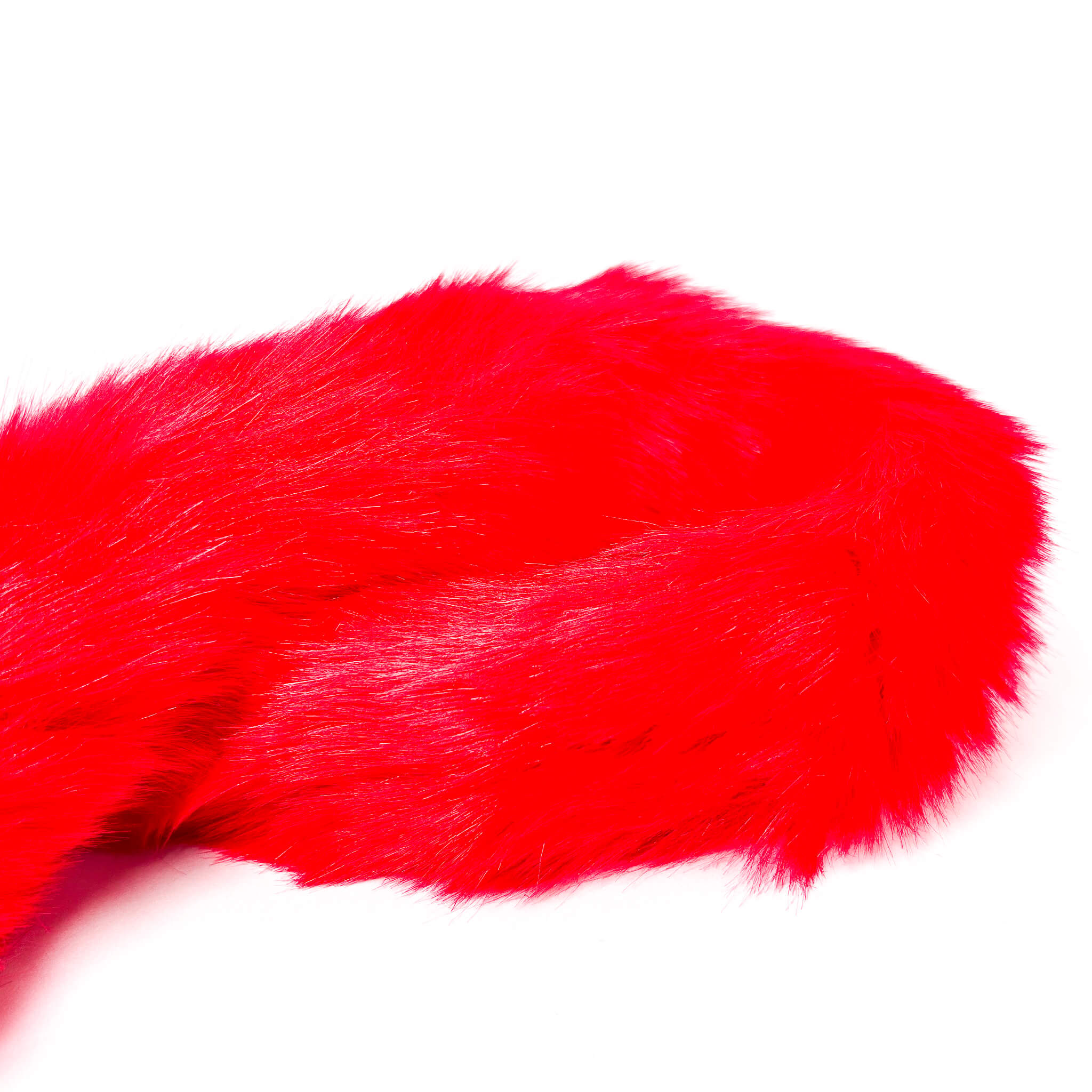 Close-up of bright red fur on a white background