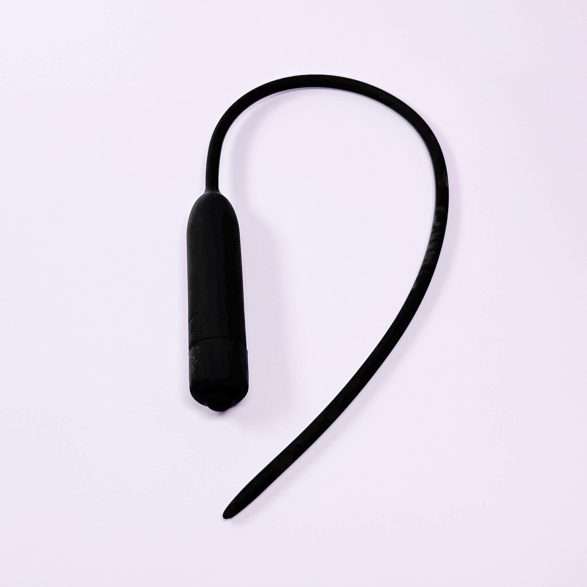 Black Extra Long Silicone Urethral Vibrator Plug on a white background