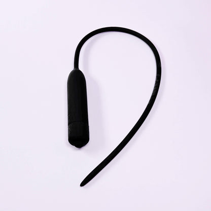 Black Extra Long Silicone Urethral Vibrator Plug on a white background
