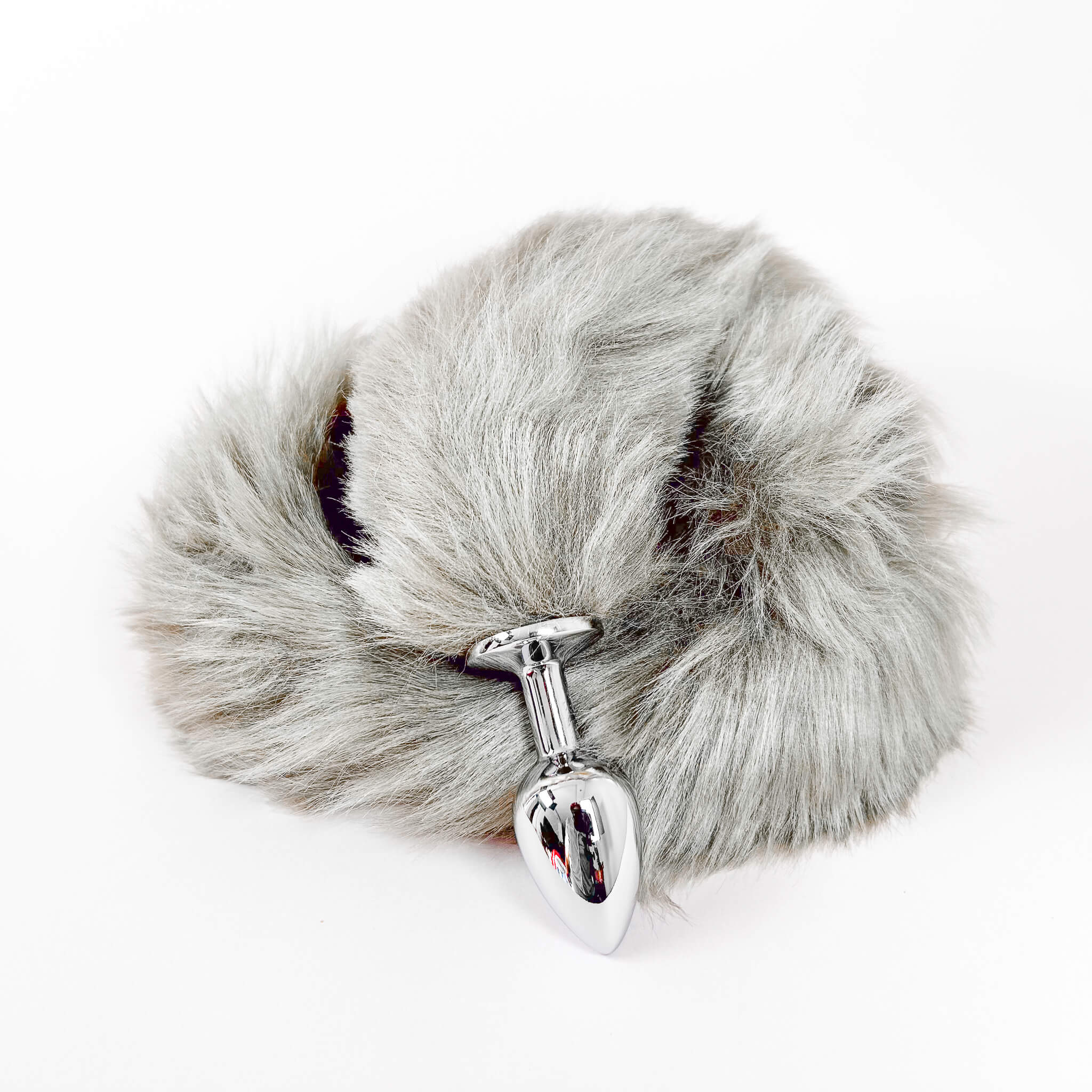 Extra Long grey fox Tail With Metal Butt Plug on a white background