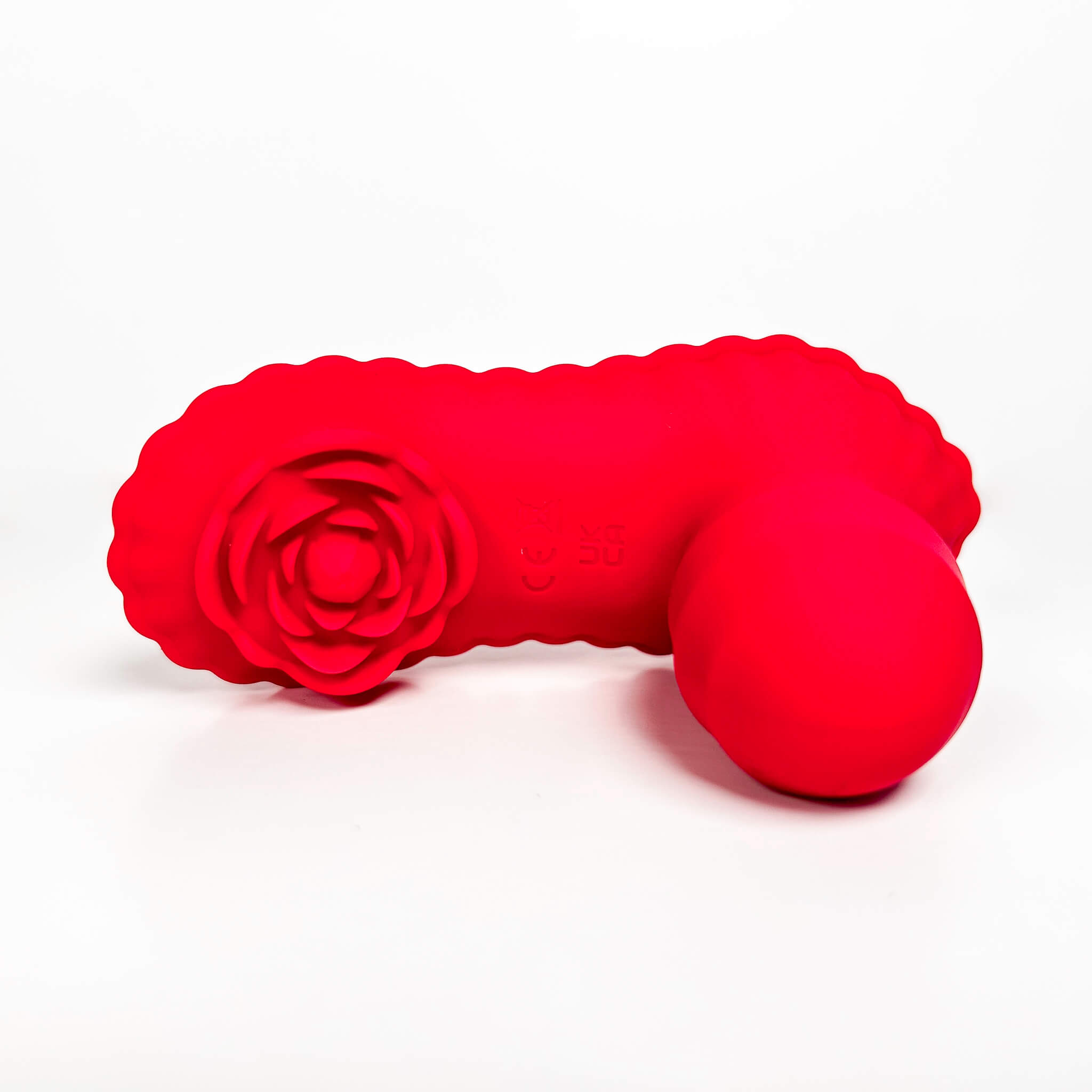 Red adult toy with a rose design on a white background