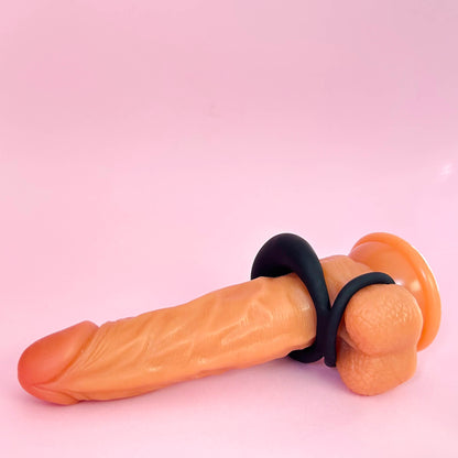 Sexual product with black band on a pink background