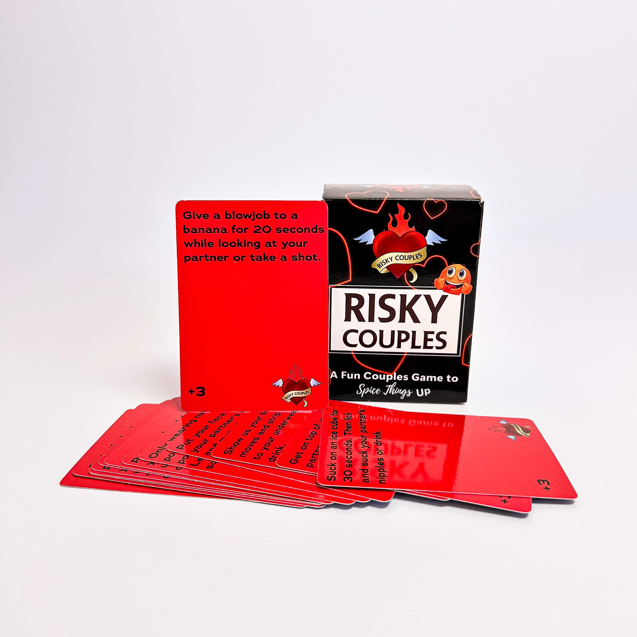 Risky Couples game cards and packaging on a white background