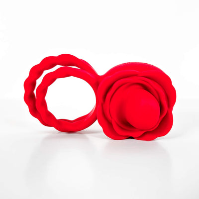 Red flower-shaped cock ring on a white background
