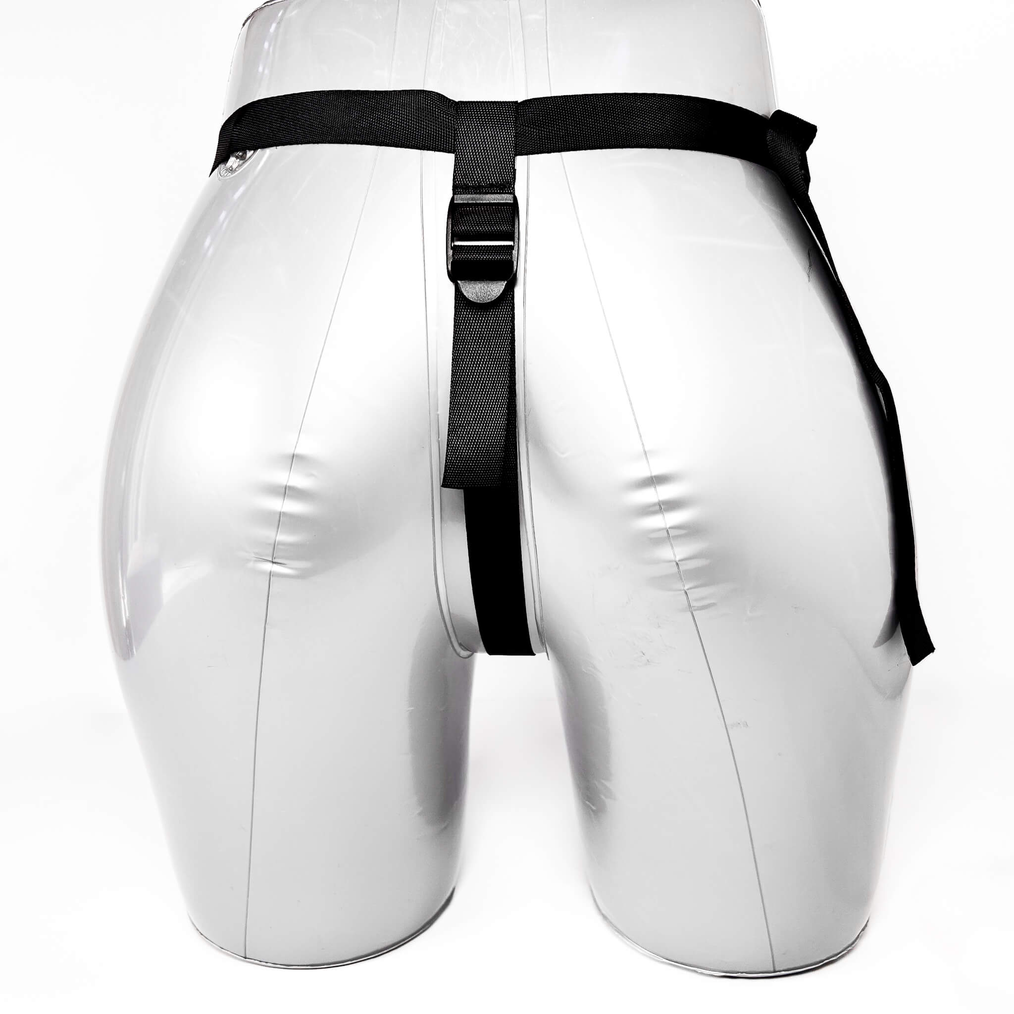 White shiny shorts with a black belt on a white background