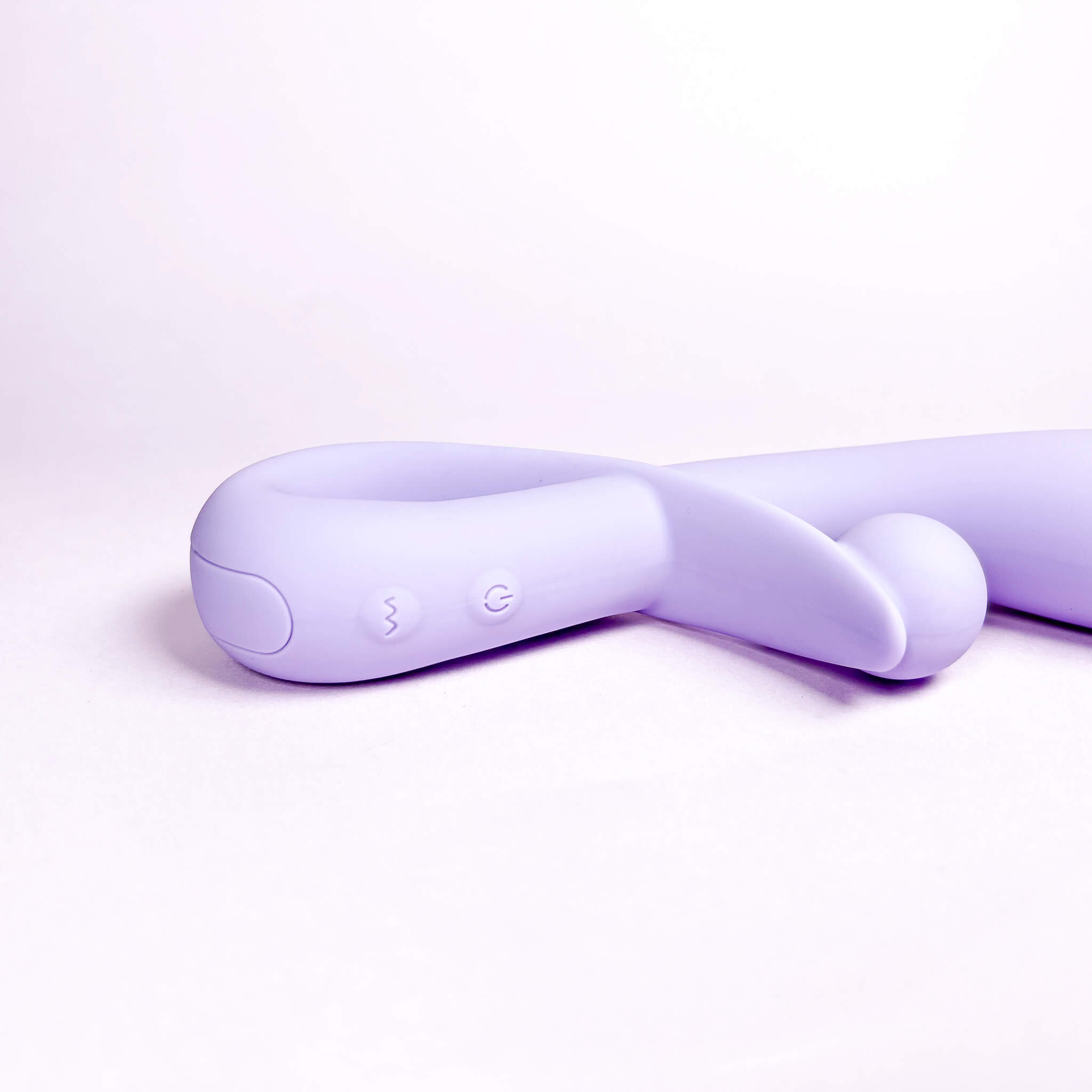 Purple rabbit vibe device on a light purple background