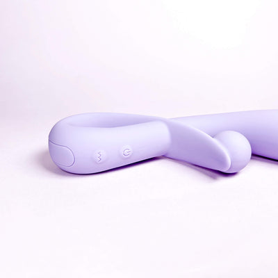 Purple rabbit vibe device on a light purple background