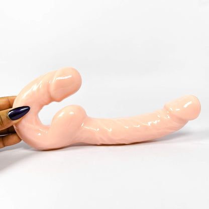 Ultra Realistic Strapless Double Ended Dildo (24cm/9.2inch) by a hand on a white background