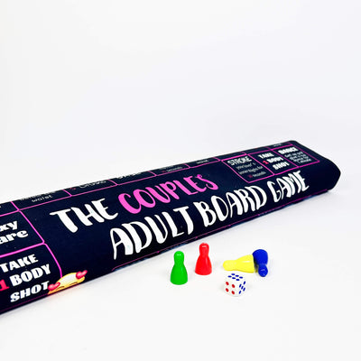 Board game box titled 'The Couples Adult Board Game' with game pieces and dice on a white background