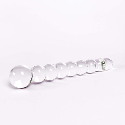 Beaded glass dildo on a white background