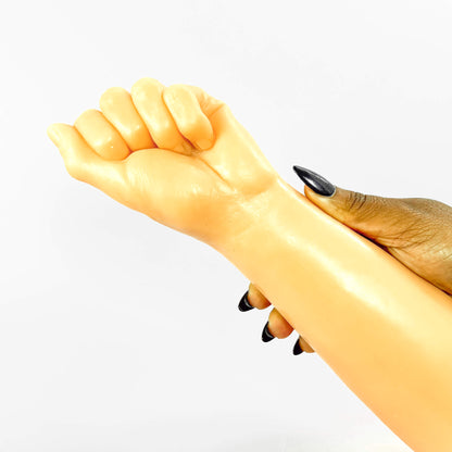 fist dildo on a white background