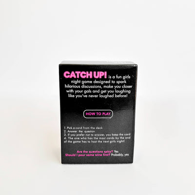 Black catch up card game box with pink and white text on a white background