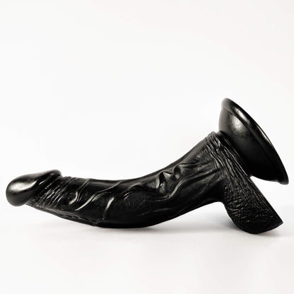 black curved dildo on a white background