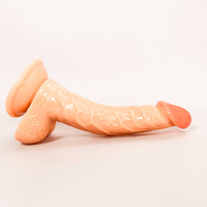 curved tip dildo on a white background