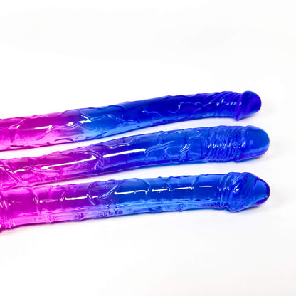 Three purple and blue textured double-sided dildo on a white background