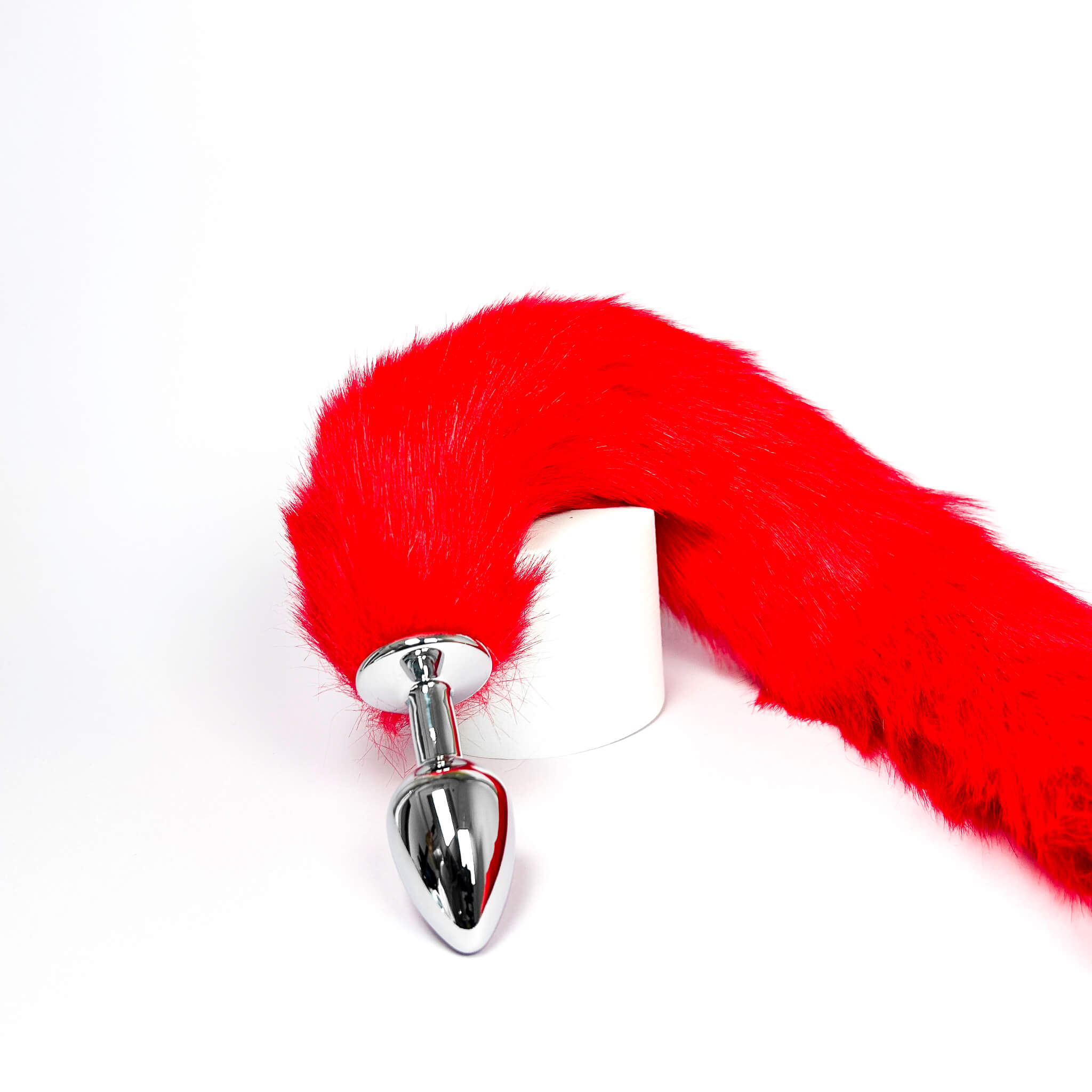 extra long furry tail plug red on a white background