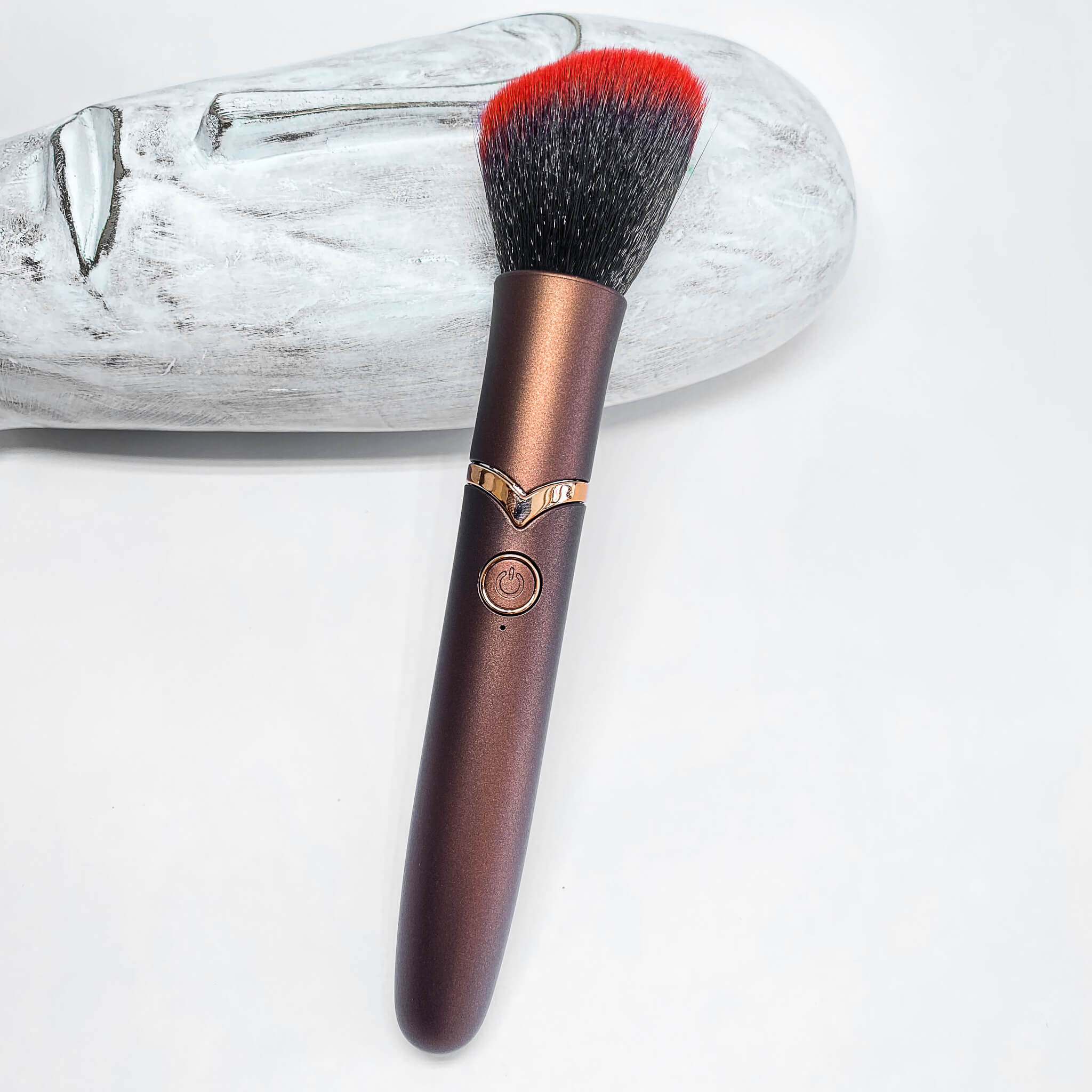 gold vibrator makeup brush