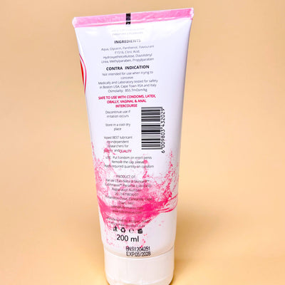 Back label of a lubrimaxx product with pink design on a beige background