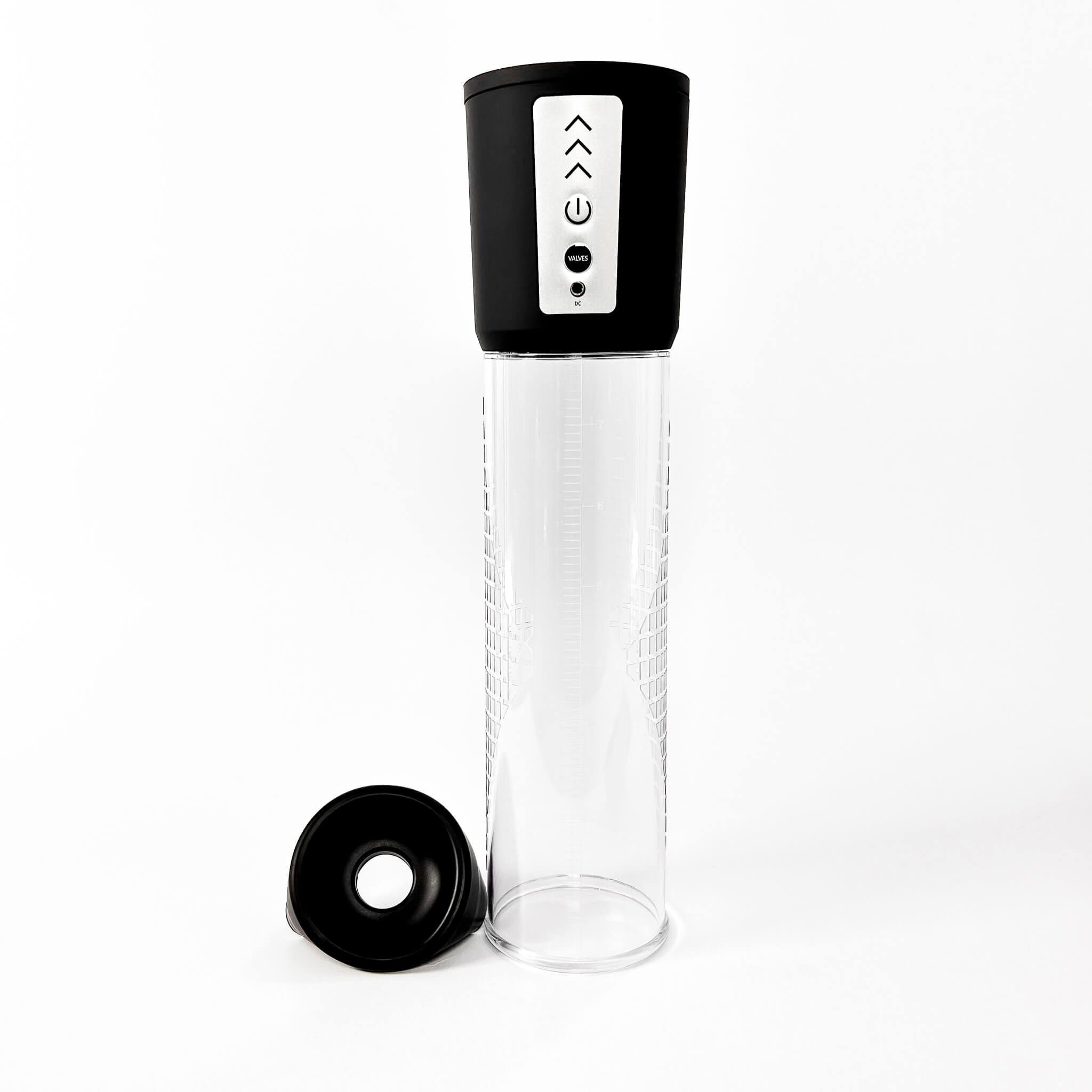 penis pump for ed with black cap and base on a white background