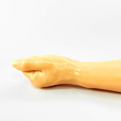 realistic fist dildo on a white background