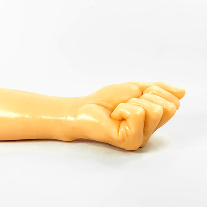 realistic fisting dildo on a white background