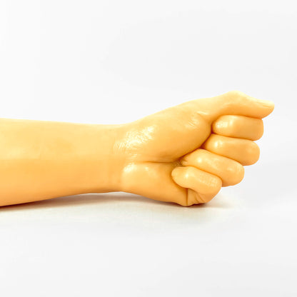 realistic large fisting dildo with a clenched fist on a white background