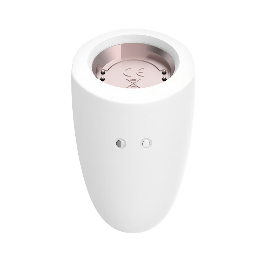 White electronic device with a rose gold top on a white background