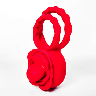 Red silicone tongue cock rings on a white background