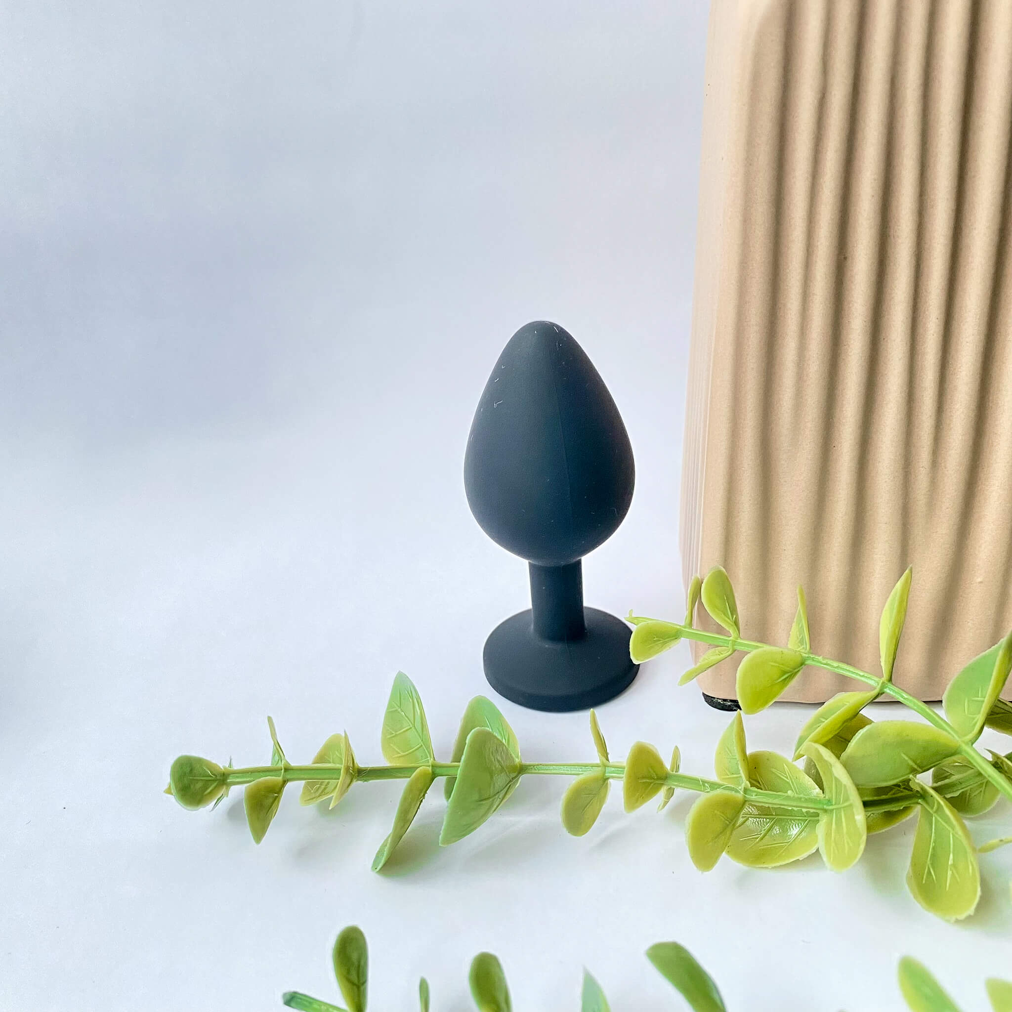 medium silicone jeweled butt plug black