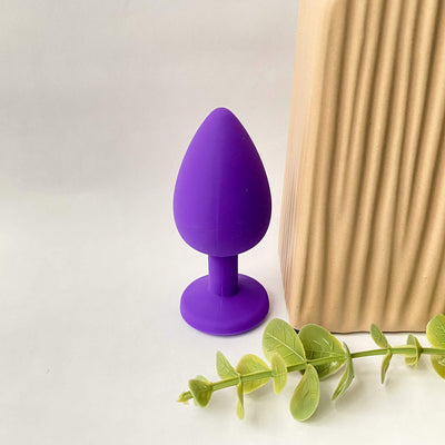 medium silicone jeweled butt plug purple