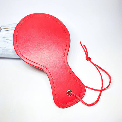 red bdsm paddle